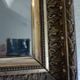 Antique mirror in wood and gilded stucco
