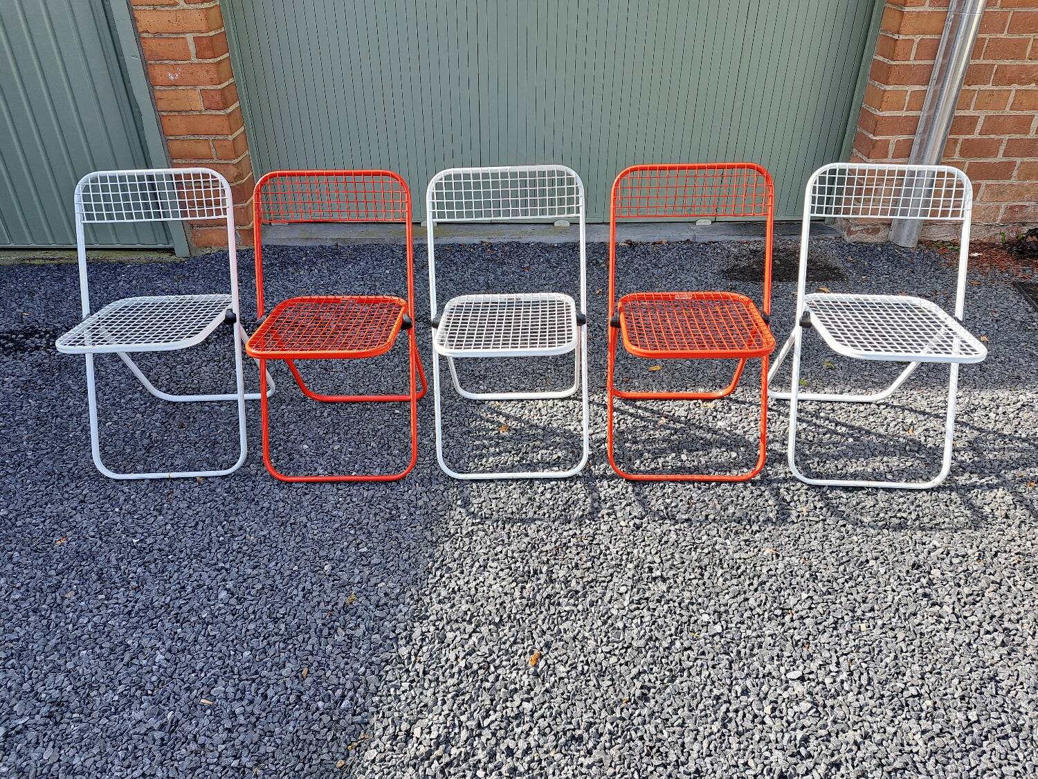 Series of 5 Talin folding metal chairs