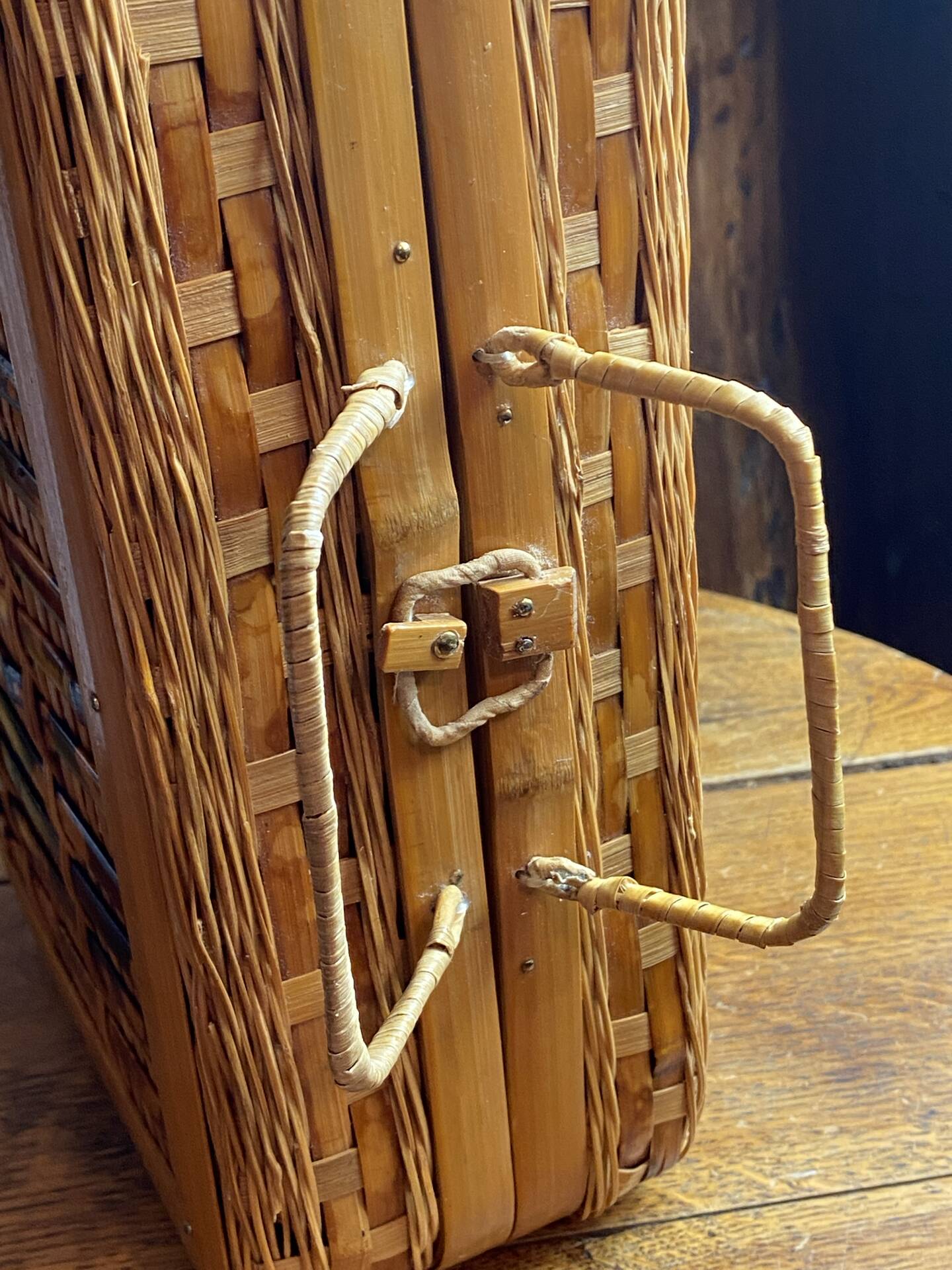 Wicker and wood suitcase