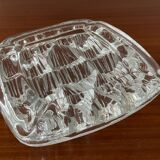 Empty vintage molded glass pocket