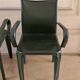 Set of 4 green leather chairs