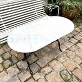 Oblong bistro table in grey marble and black cast iron