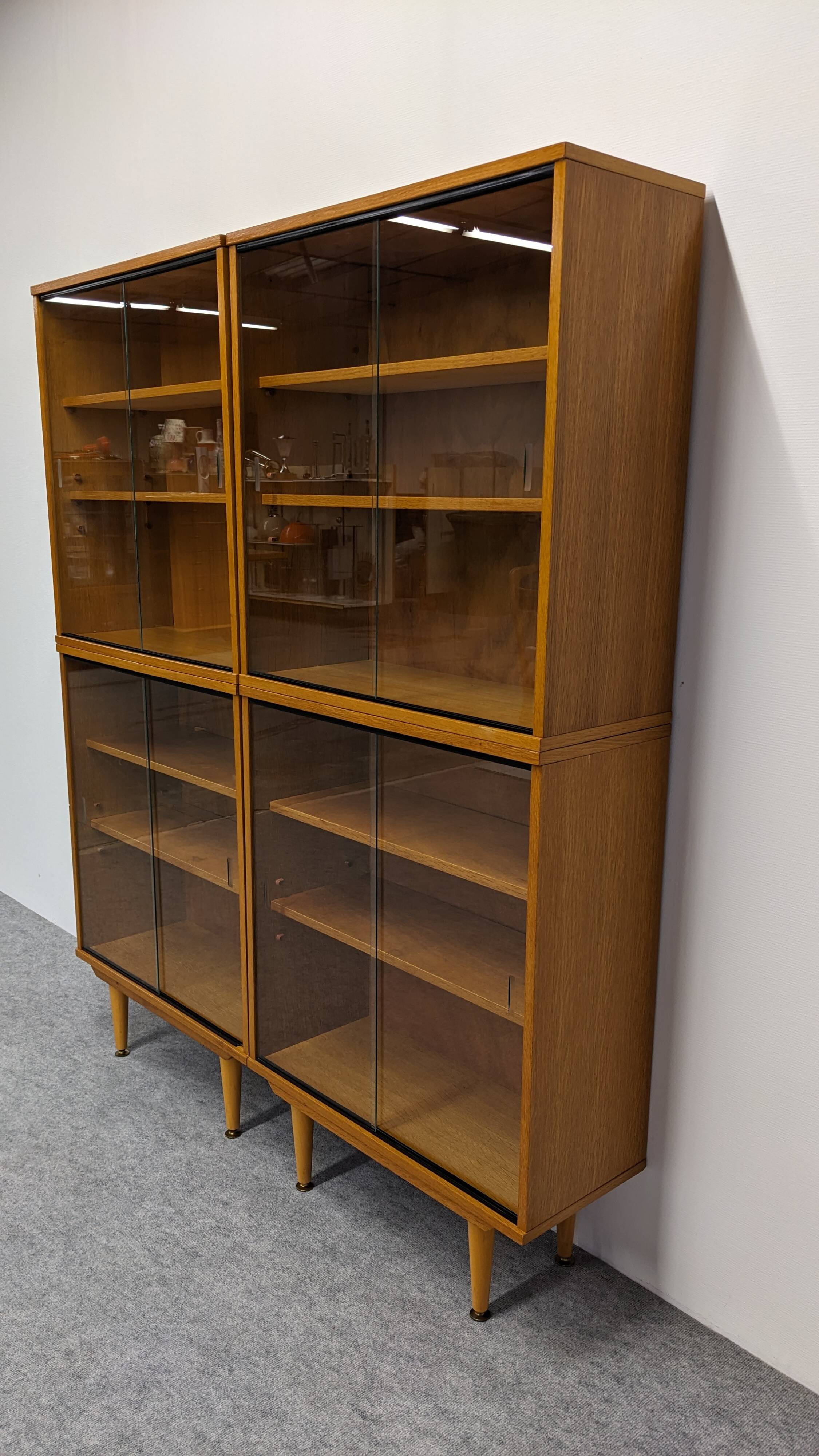 Library or display cabinet with 4 modules in light oak, France around 1960.