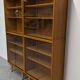 Library or display cabinet with 4 modules in light oak, France around 1960.