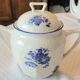 Blue and white ceramic coffee service with vintage flowers.