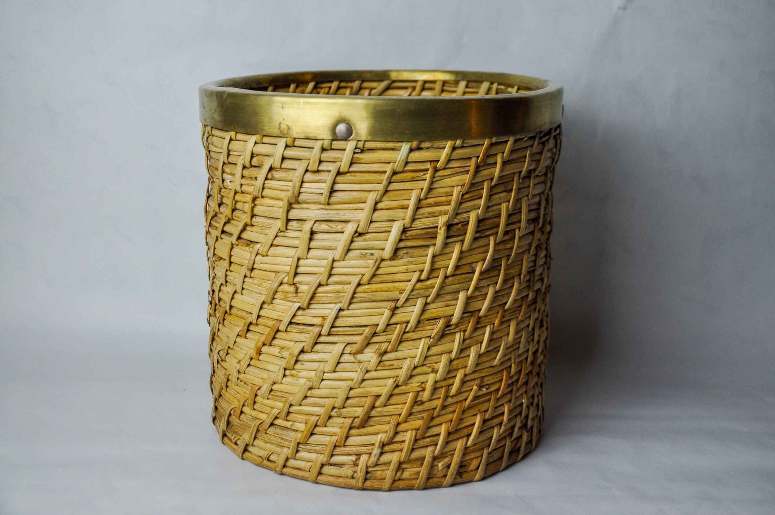 Rattan and brass book basket, Italy, 1970