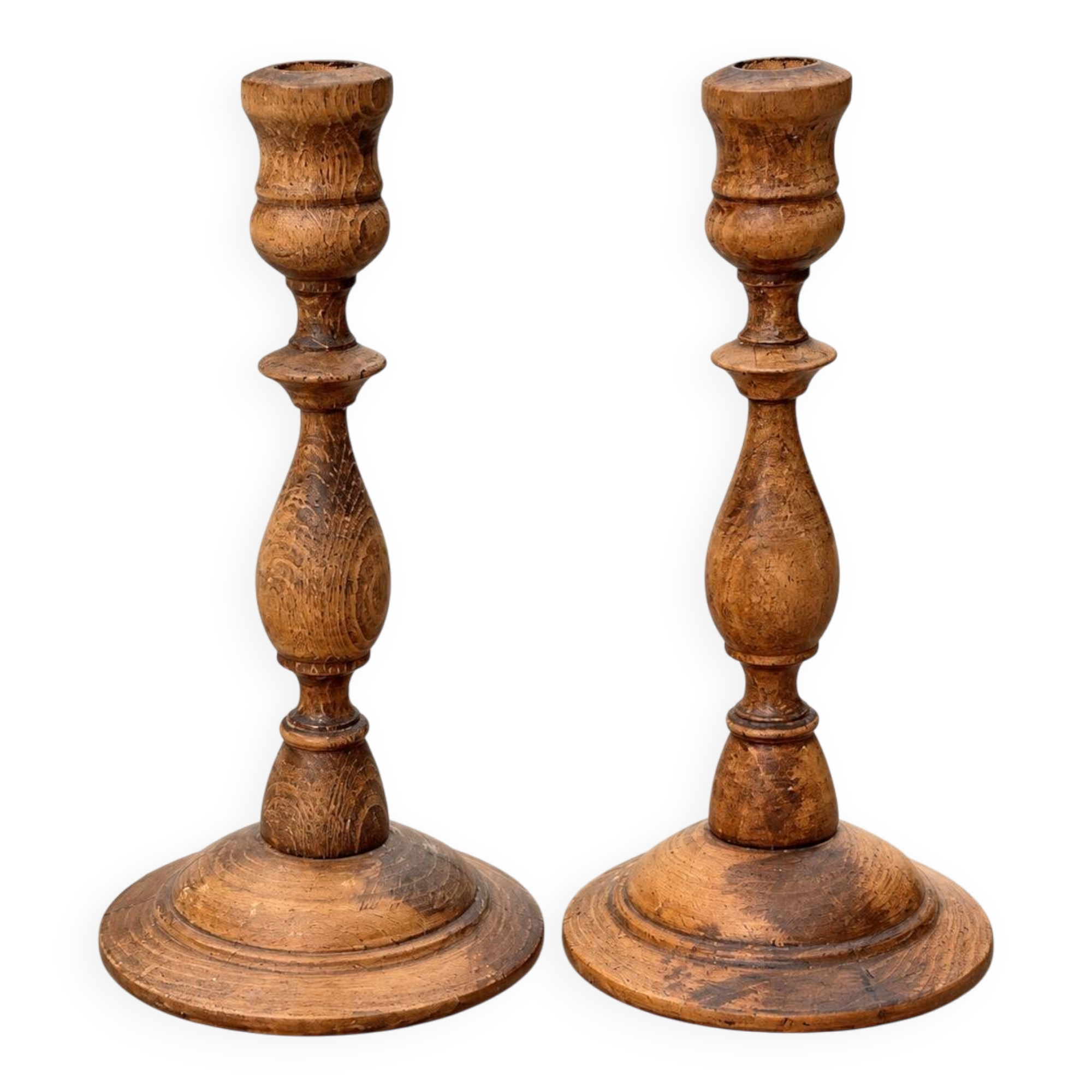 Pair of antique turned wooden candlesticks