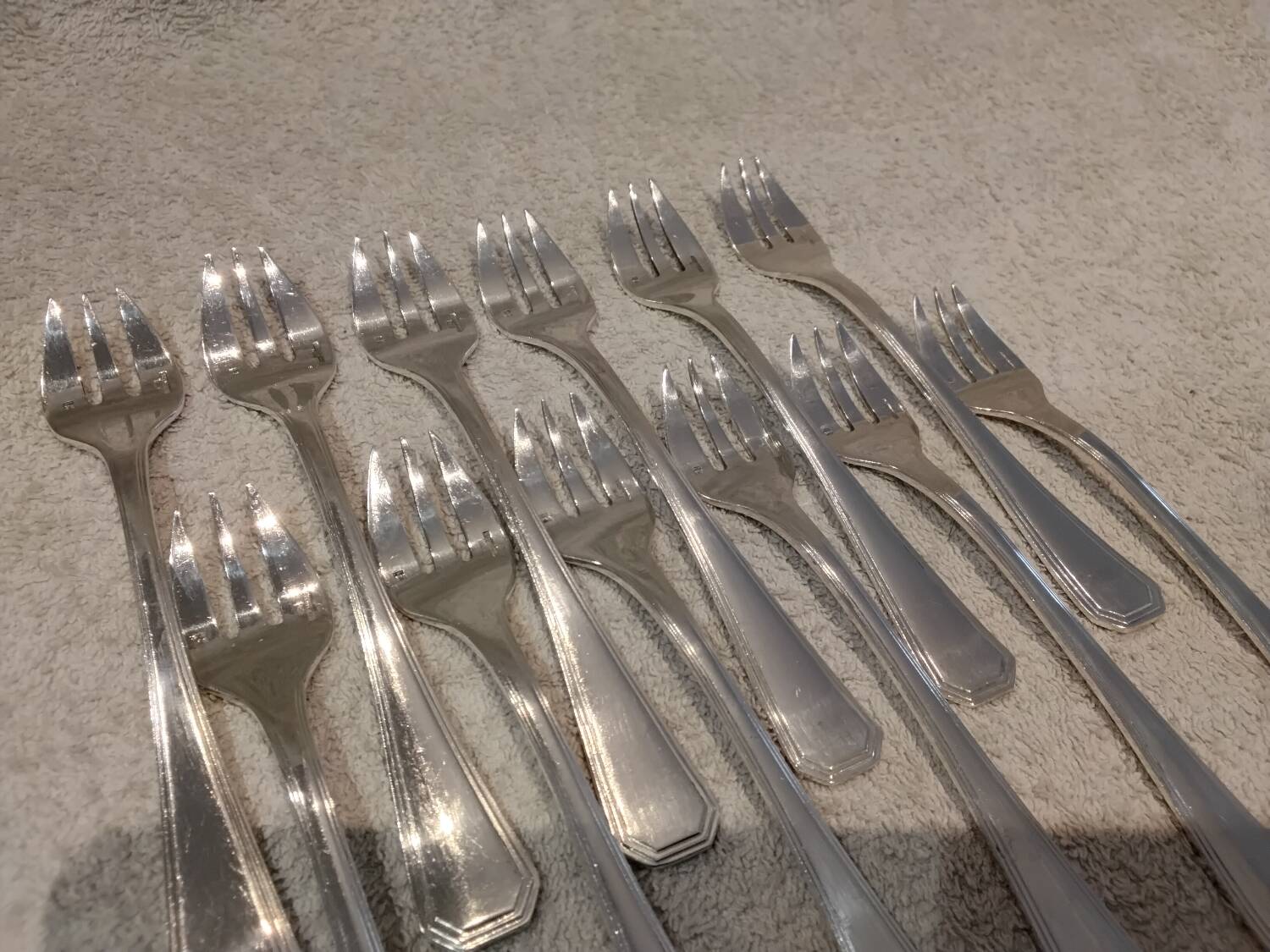 12 silver-plated oyster forks by Christofle America