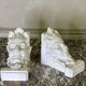 Pair of white statuary marble consoles, with faun heads