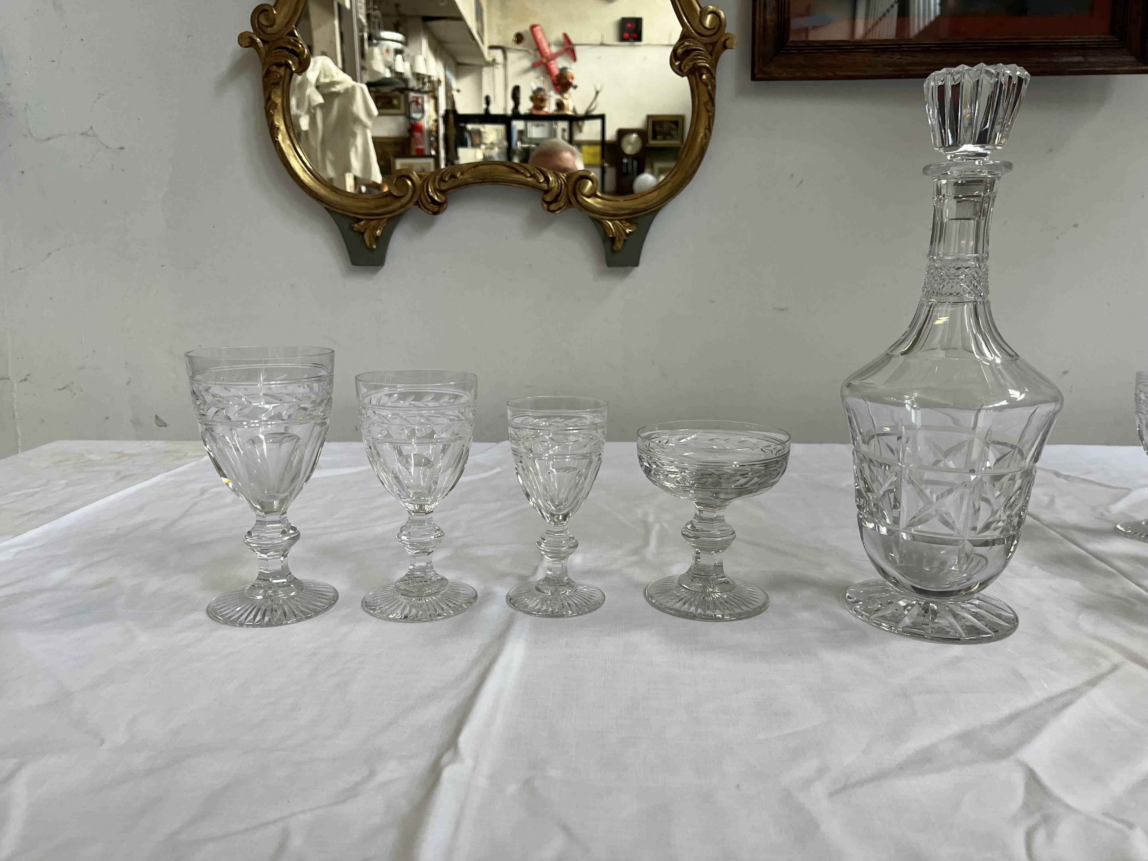 suite of 26 glasses + baccarat crystal carafe