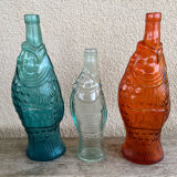 3 glass bottle fish