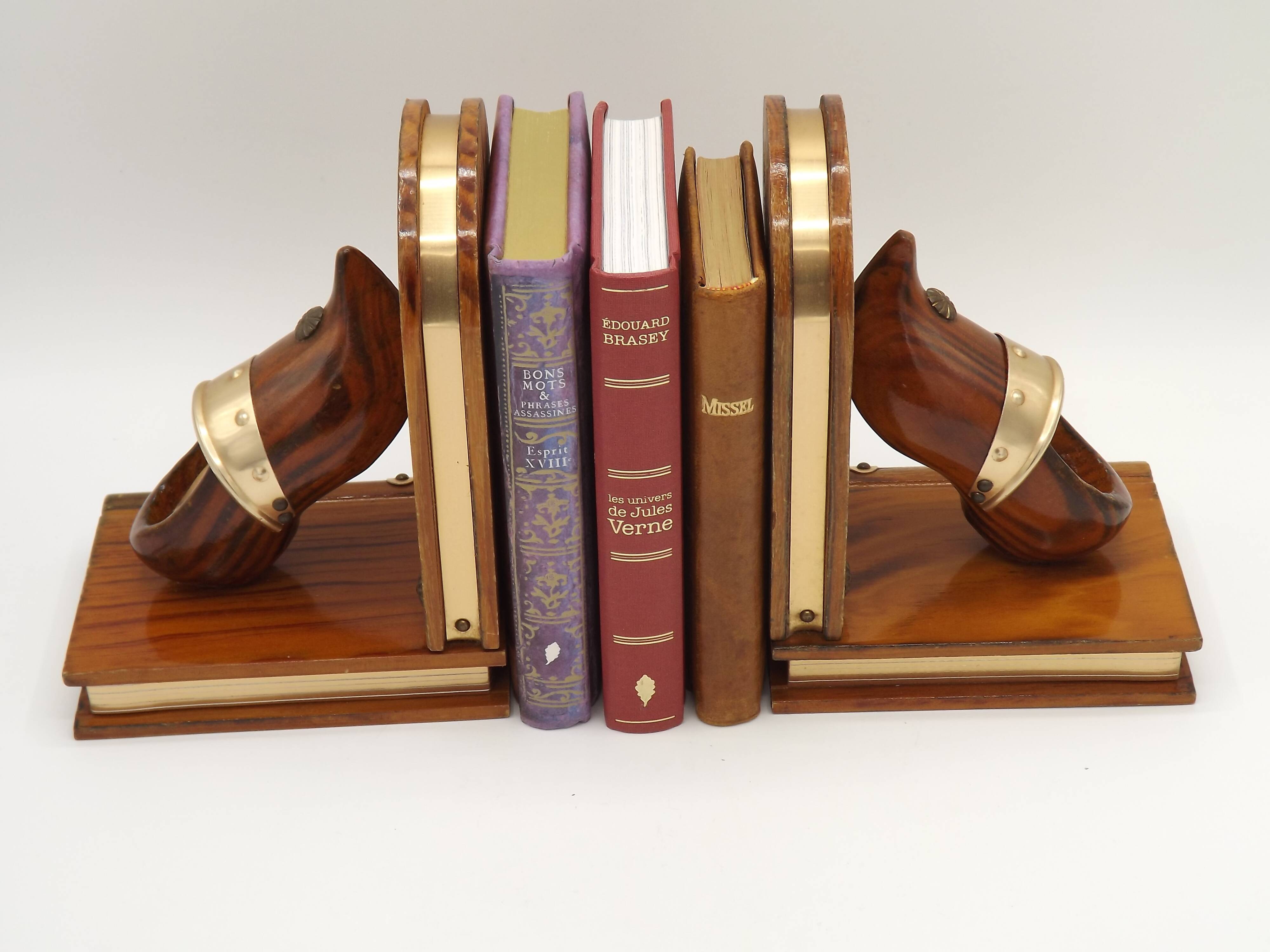 Vintage French Breton wooden bookends hand-carved with book and clog motif.