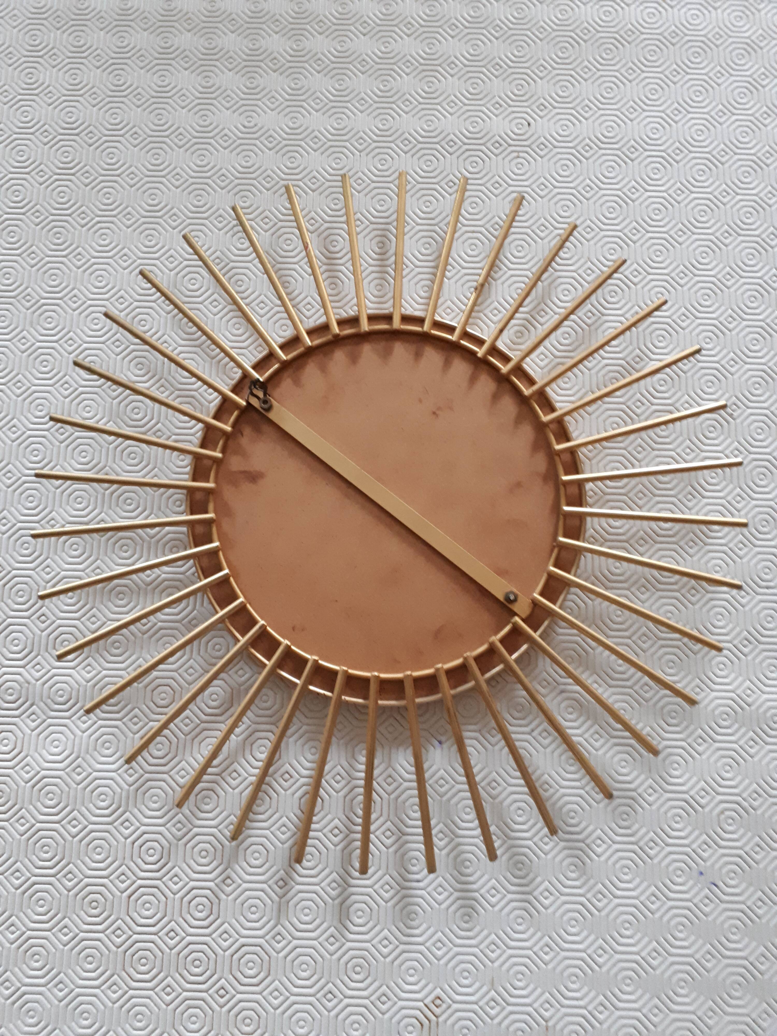 Mirror soleil metal dore 40cm