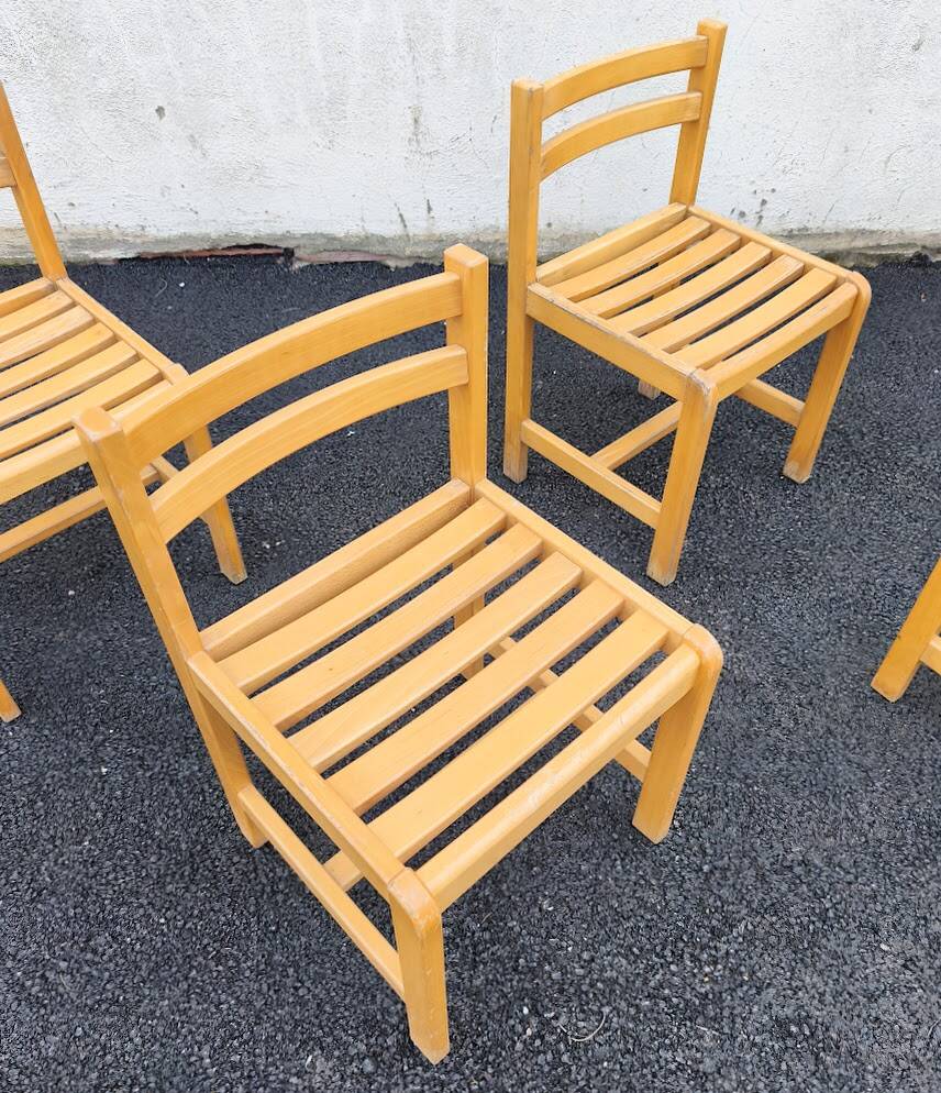 Set of 4 varnished wooden chairs, André Sornay