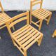 Set of 4 varnished wooden chairs, André Sornay