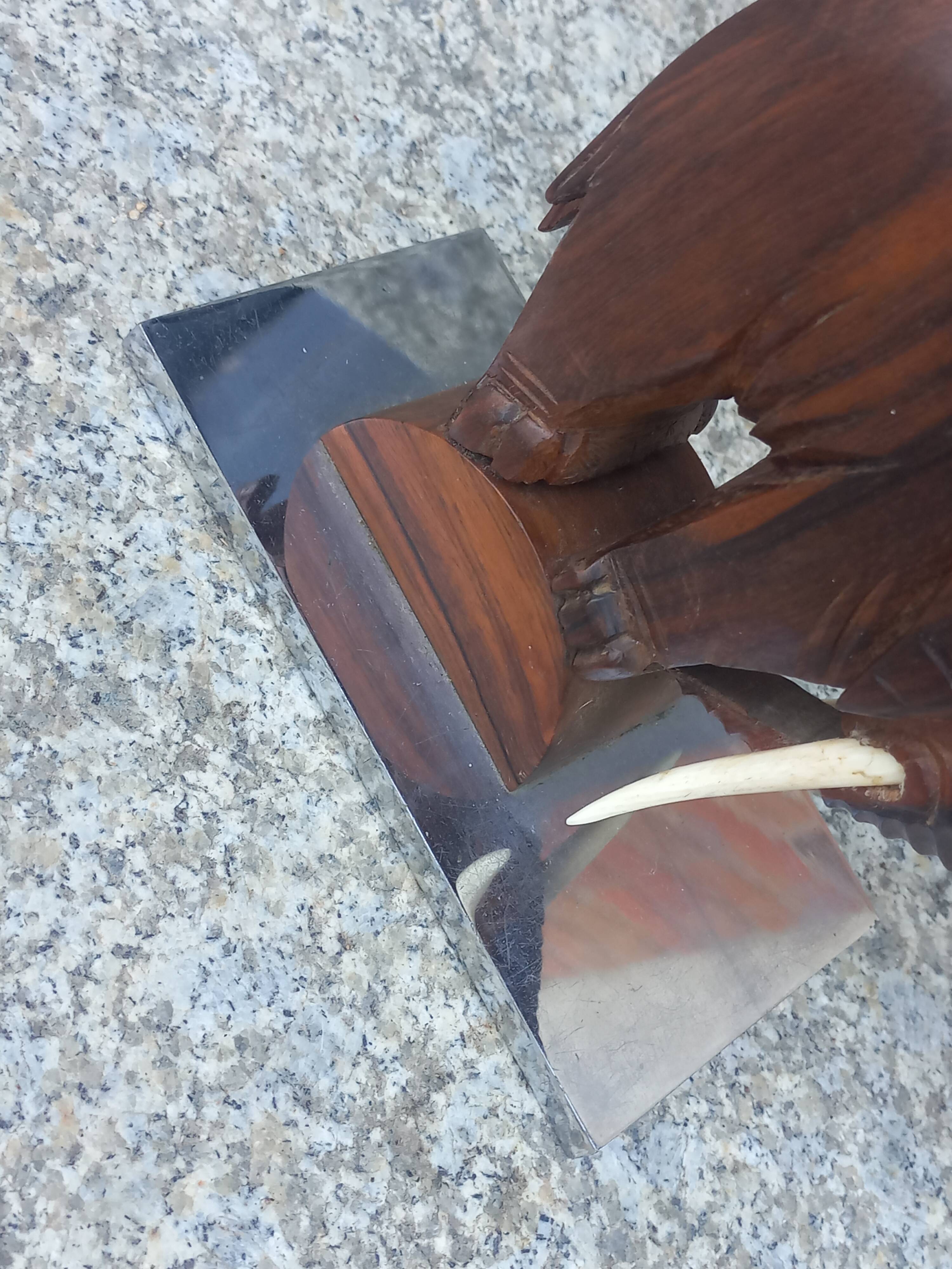 Pair of Art Deco elephant bookends in rosewood with chrome base.