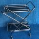 1970 folding server on wheels smoked glass