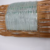 Glass and rattan sconce