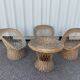 salon avec 3 fauteuils en osier