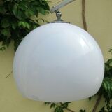 Lampadaire Arc - télescopique - piètement en travertin -