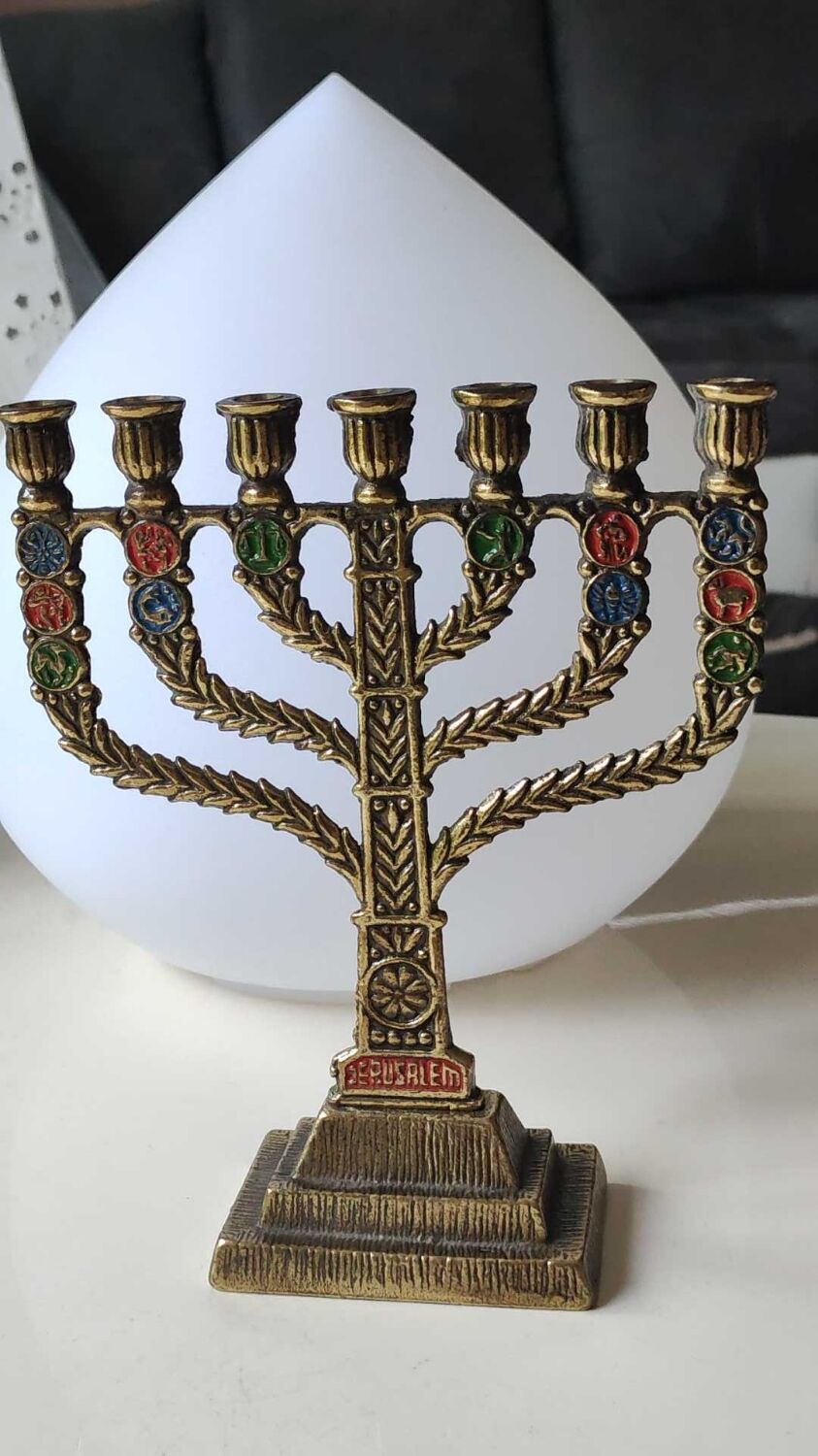 Menorah/Hebrew Candlestick with 7 branches. Astrological signs. Hanukkah. In patinated brass old gold