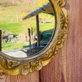 Small round antique gold mirror