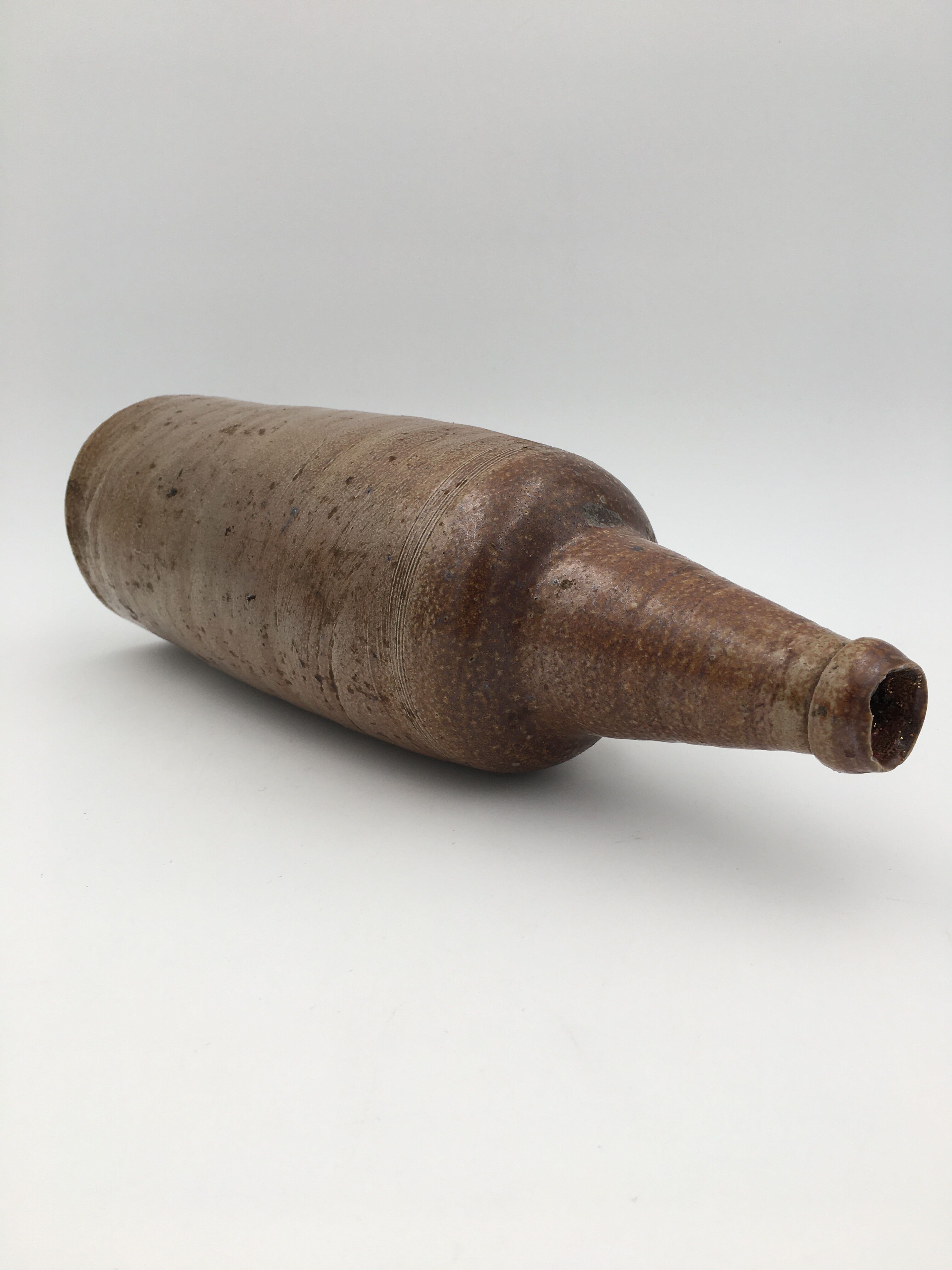 Old glazed terracotta bottle, early 20th century