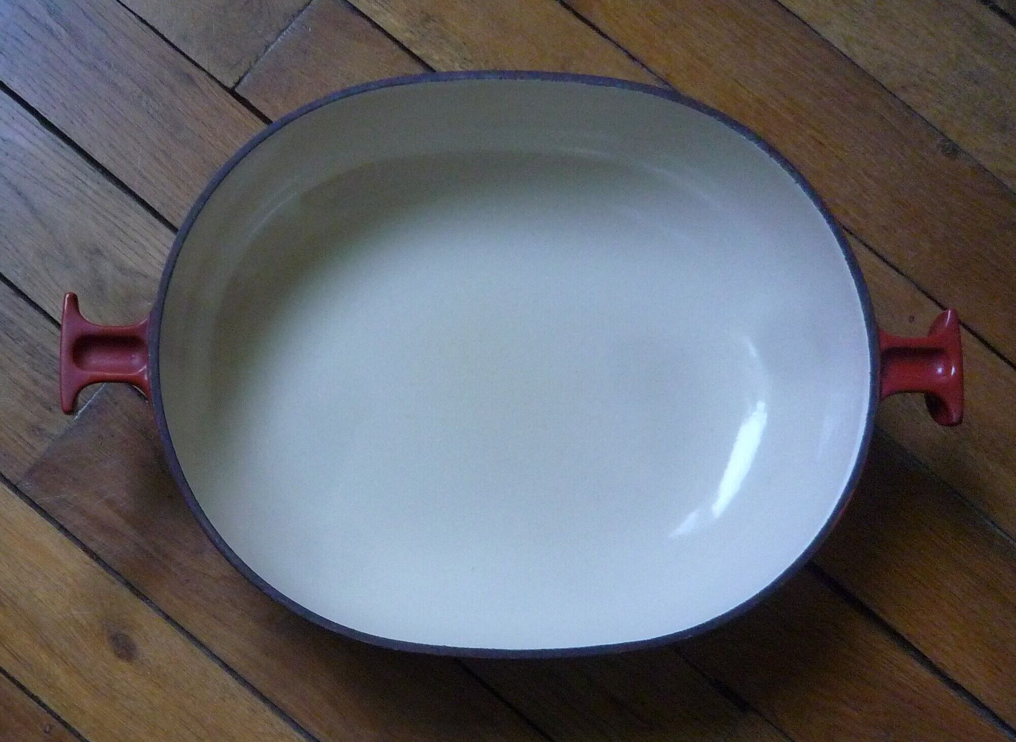 Le Creuset dish by Enzo Mari, in red cast iron, 70s