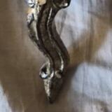 Golden wooden stool in the Louis XV style.