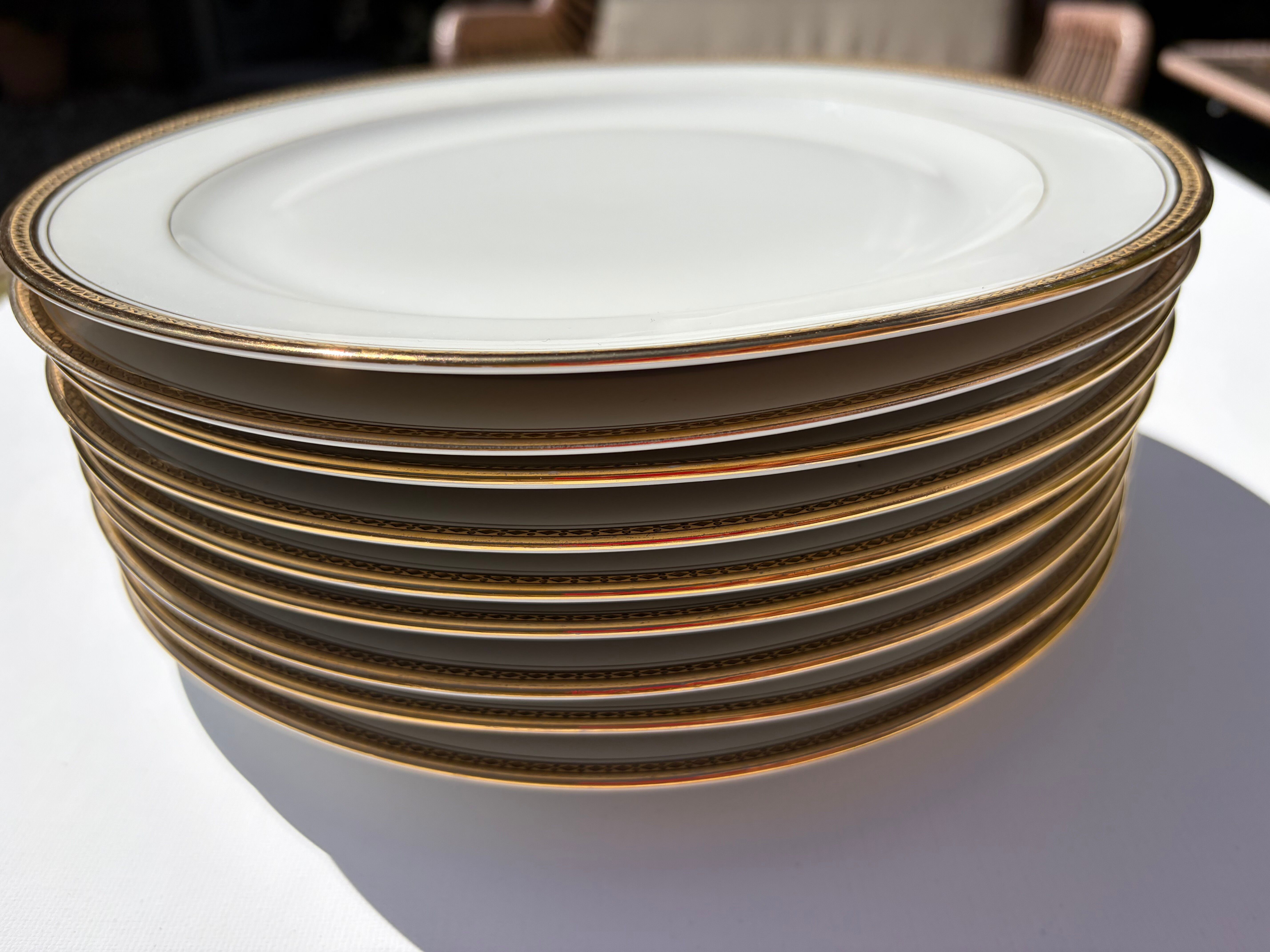 9 table plates made of Limoges porcelain