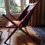 Leather folding armchair and footwork