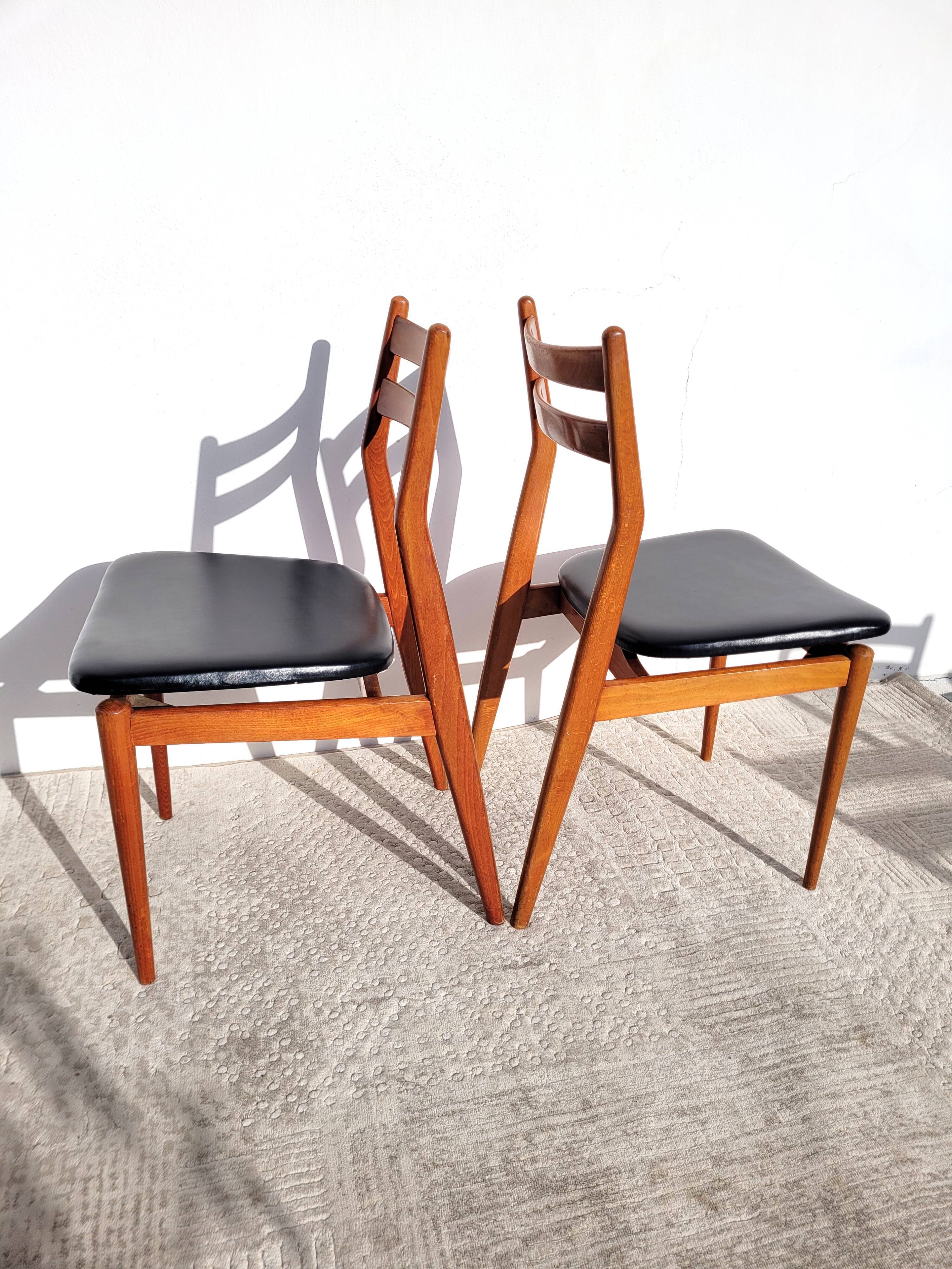 2 Scandinavian wooden chairs