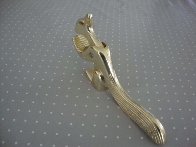 Nutcracker or hazelnuts vintage golden metal squirrel
