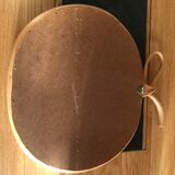 Wicker mirror in the shape of an apple