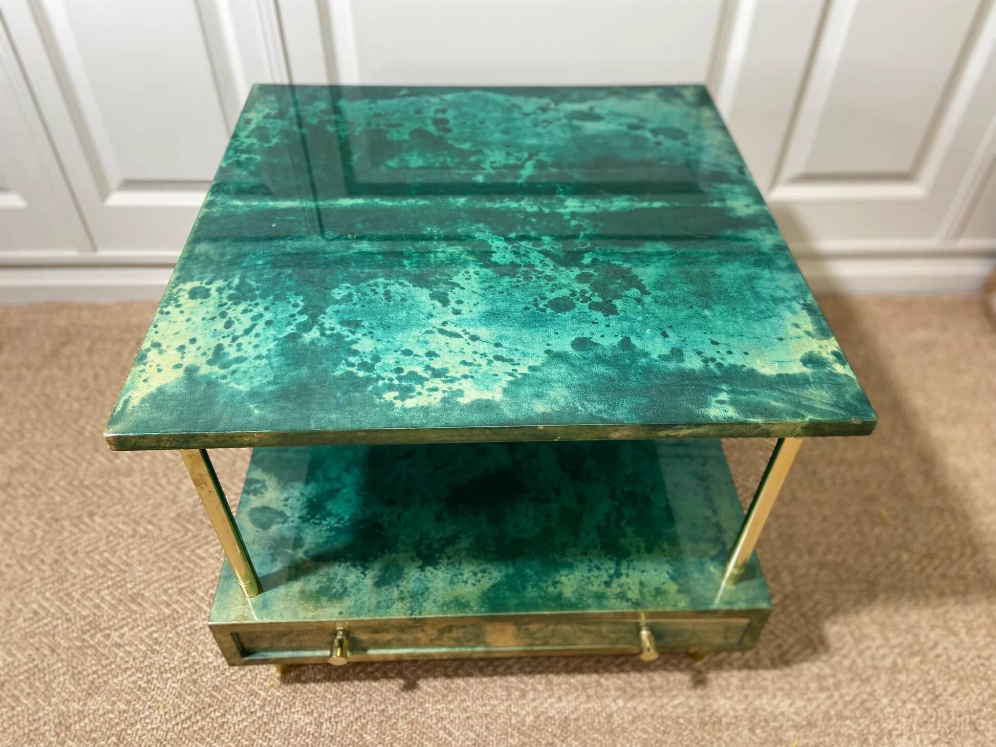 Aldo Tura side table in aqua green with brass legs and lower drawer.