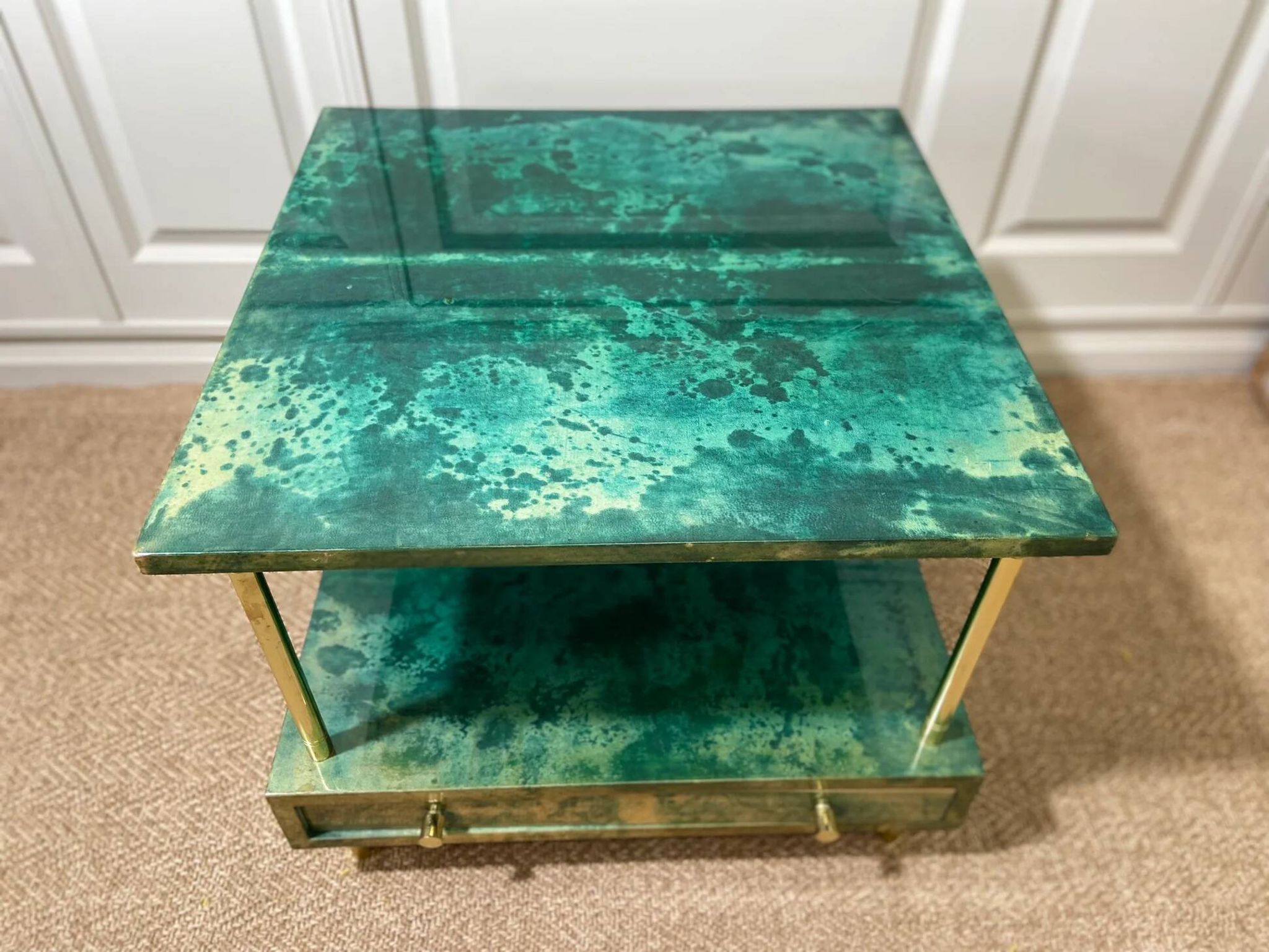 Aldo Tura side table in aqua green with brass legs and lower drawer.