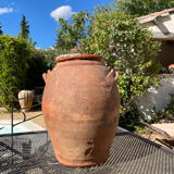 Ancient terracotta pottery jar