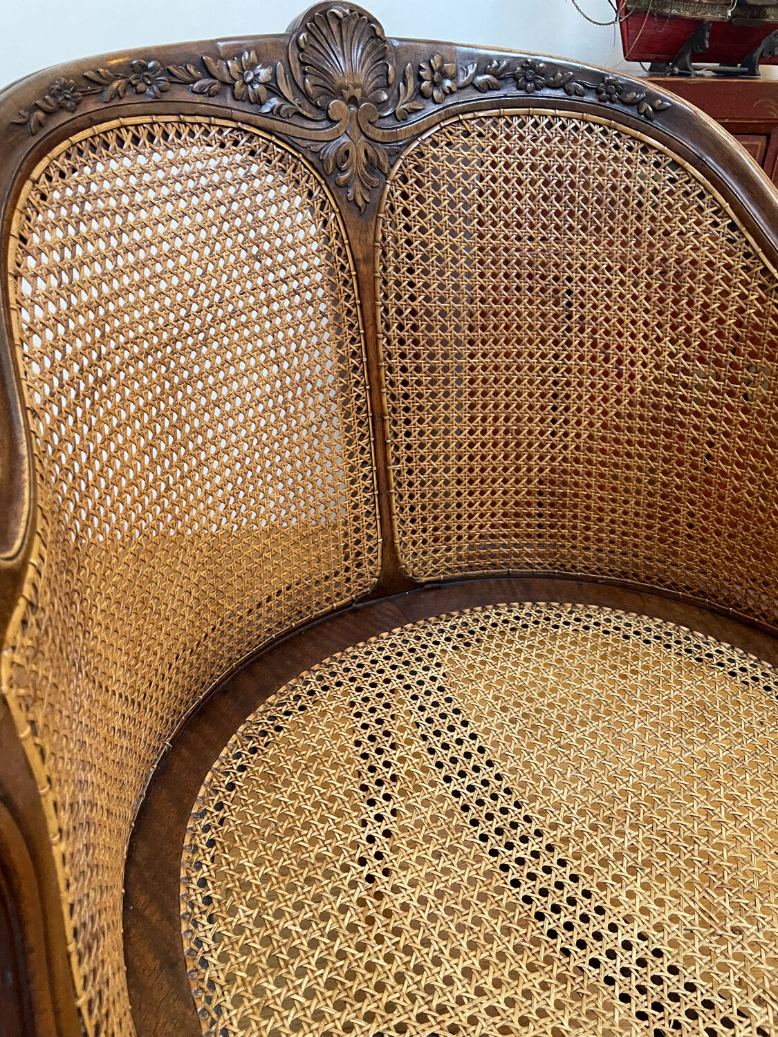 Cane seat armchair from the 19th century in the Louis XV style, known as "couillard".