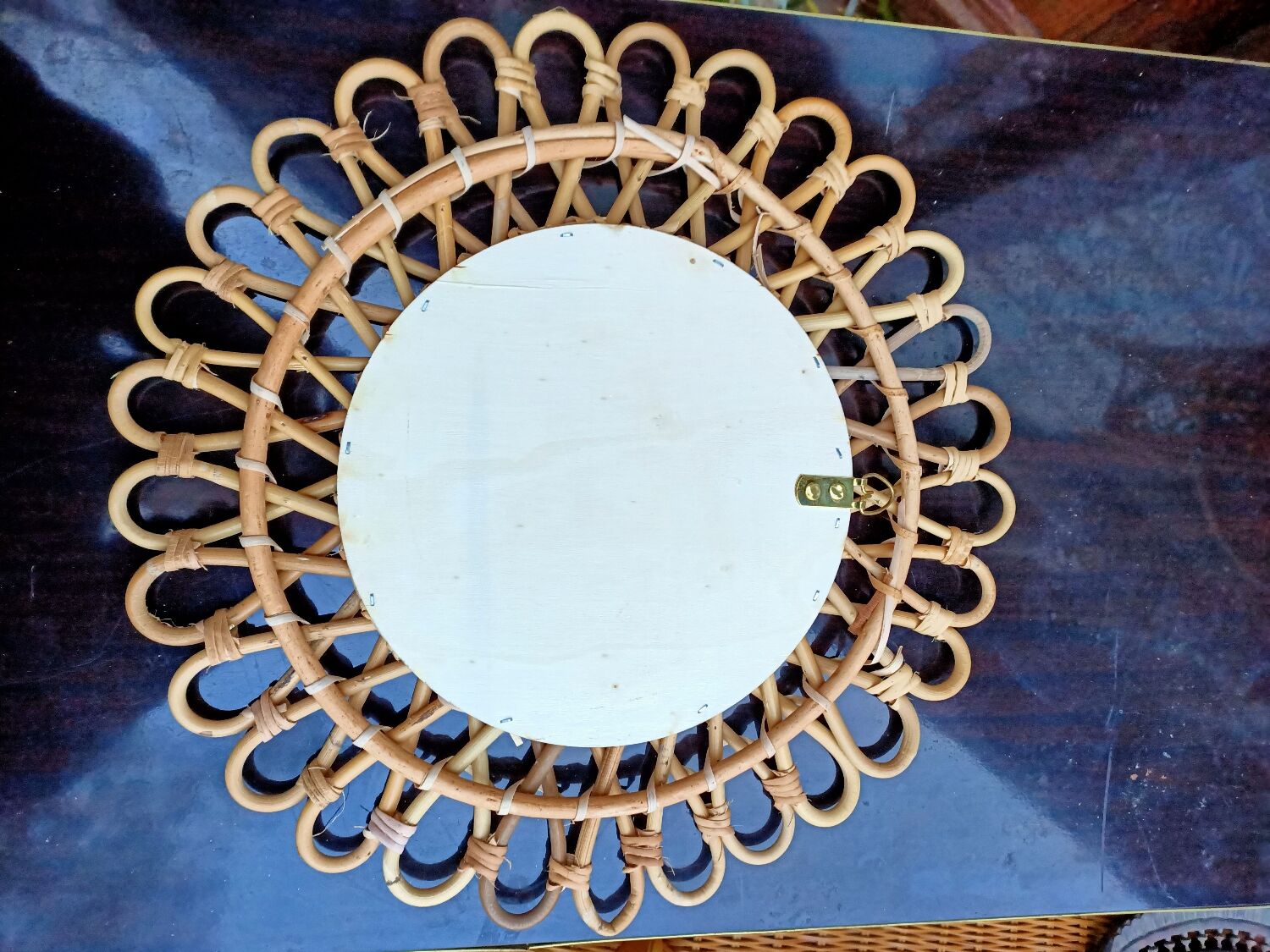 Round rattan mirror