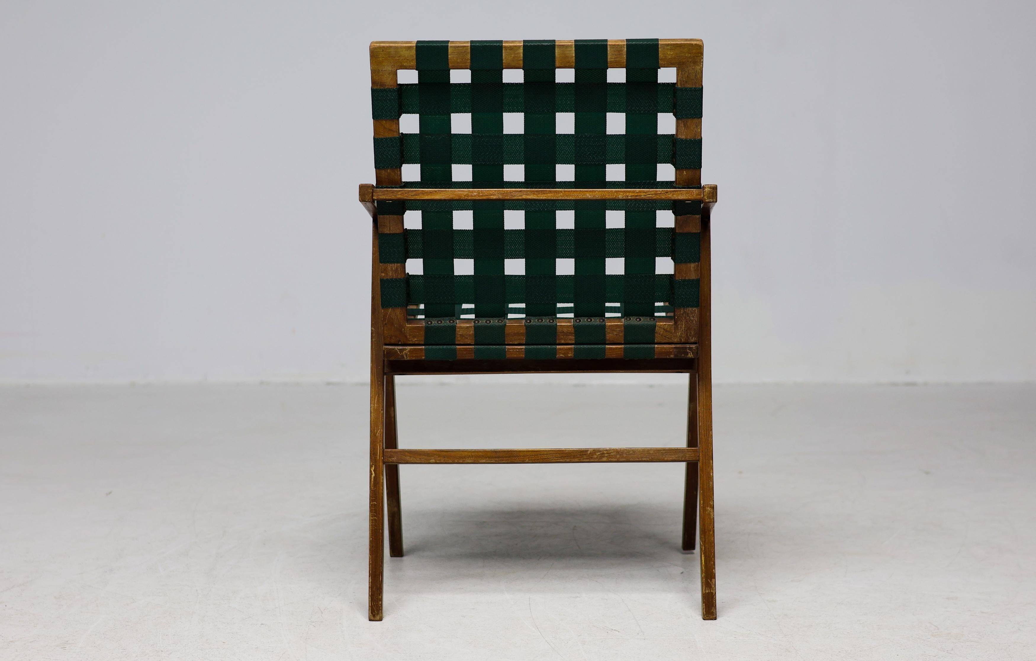 Mid-century Italian armchair in walnut with straps, in the style of Franco Albini.