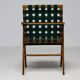 Mid-century Italian armchair in walnut with straps, in the style of Franco Albini.