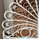 Rattan headboard & white wicker peacock tail décor 50-60s