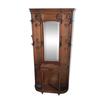 Oak and wrought iron coat rack from around 1900.