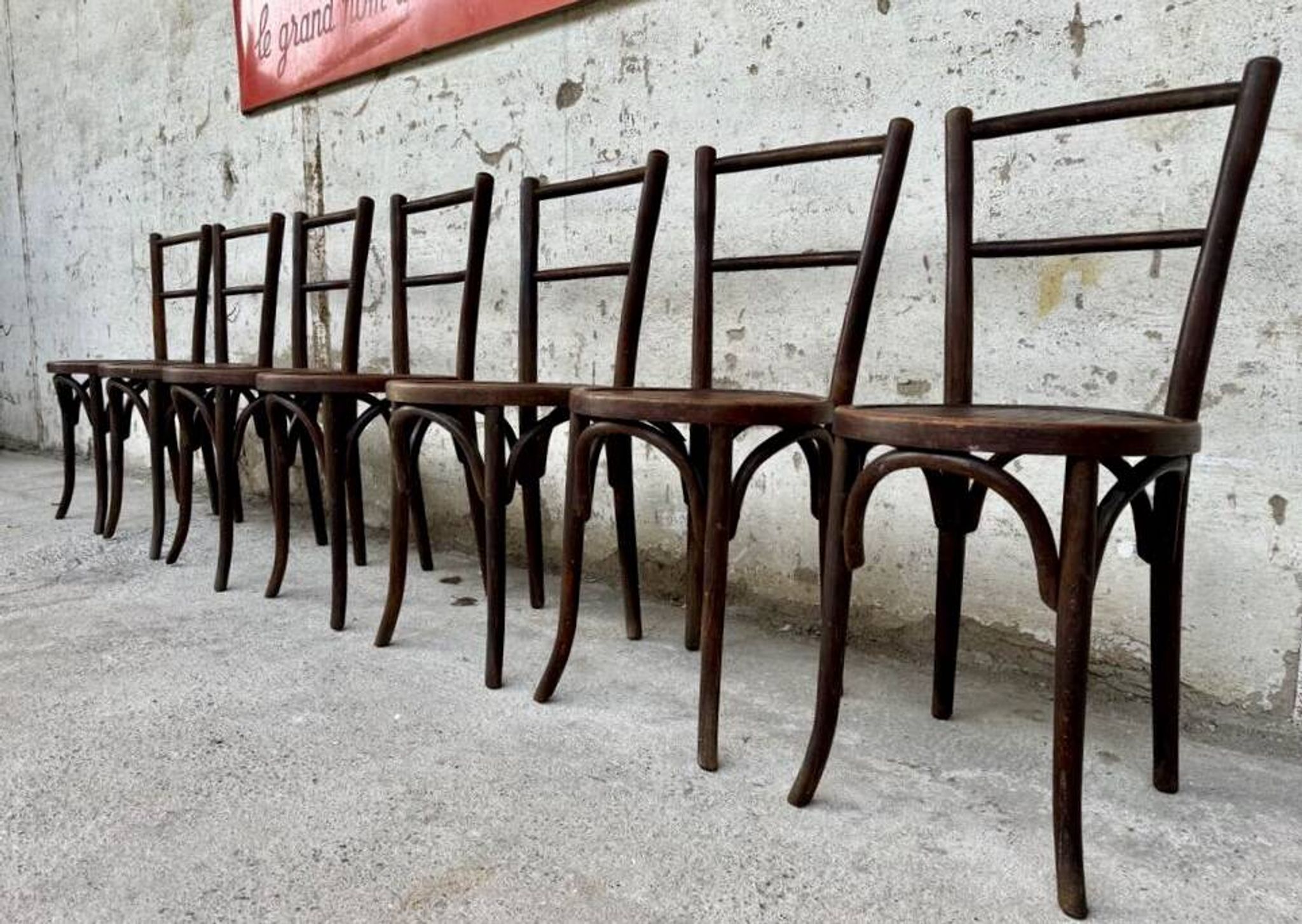 Set of 7 old Baumann bistro chairs in curved wood with round seat