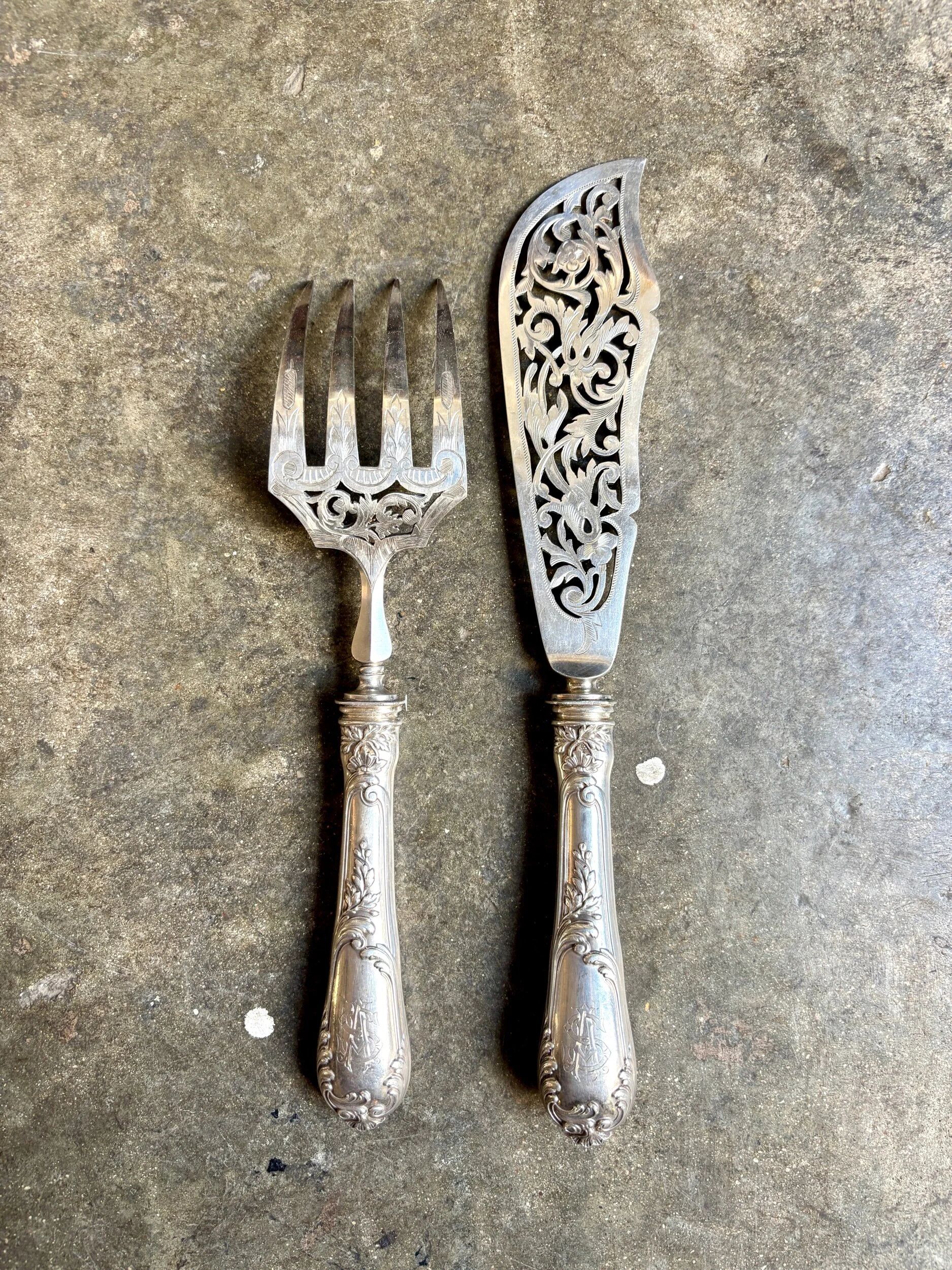 2 silver openwork service cutlery sets engraved with "AS"