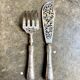 2 silver openwork service cutlery sets engraved with "AS"