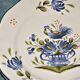 Plate decorated with a rooster earthenware from Lunéville
