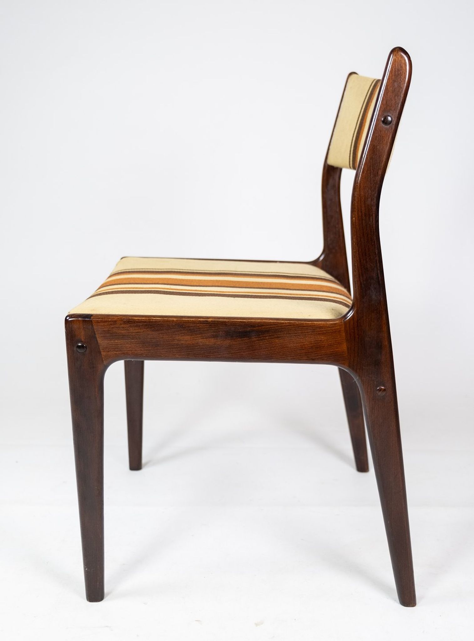 Pair of chairs in dark wood upholstered with light striped fabric of danish design