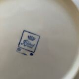 5 mismatched old white plates.