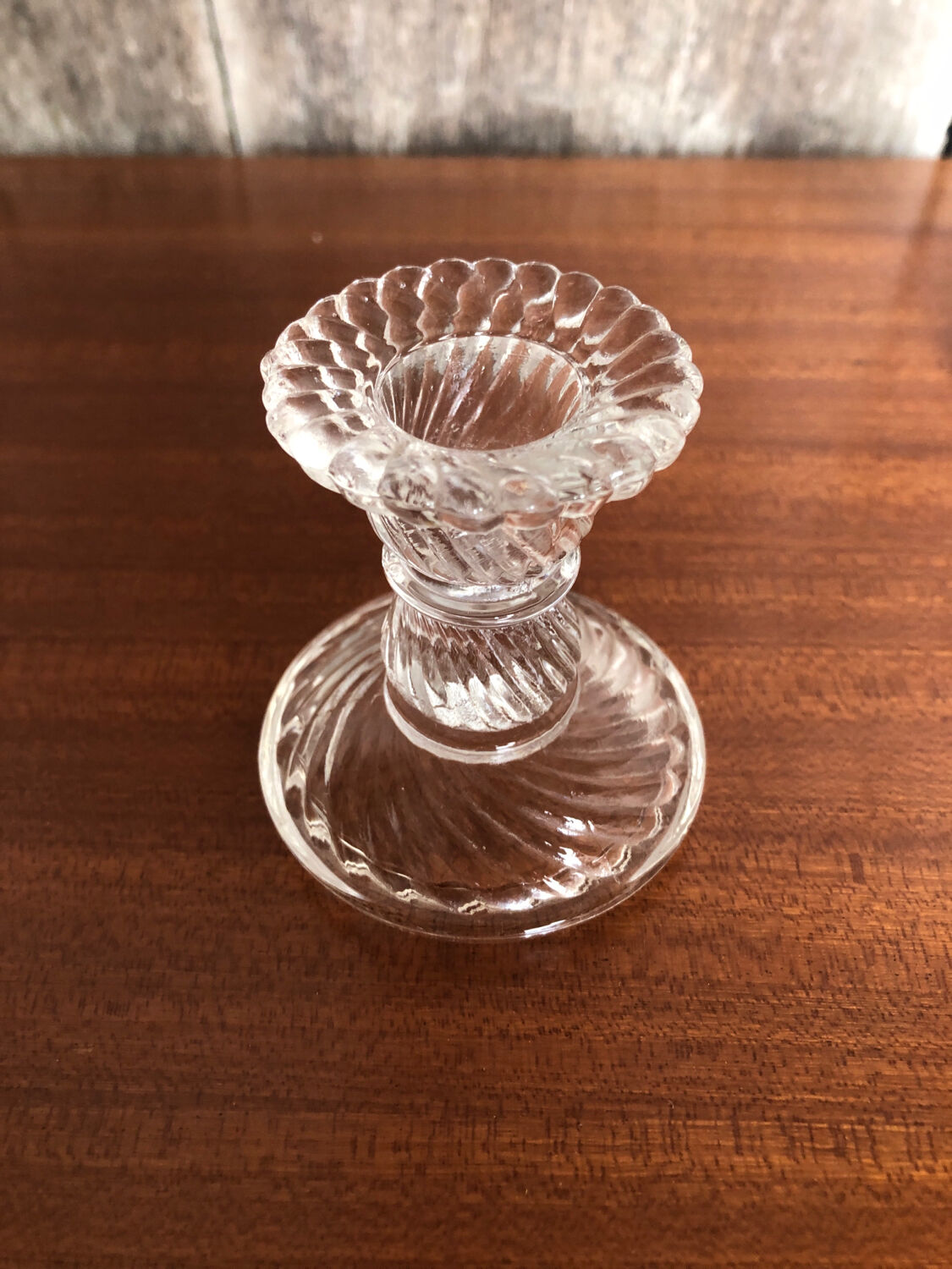 Old pair of vintage round molded glass candle holder